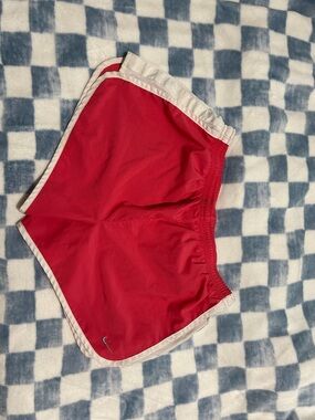 Nike Red Athletic Shorts with White Piping